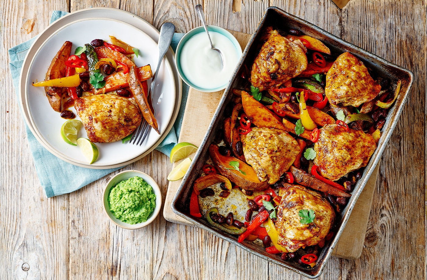 Chicken fajita traybake with pea 'guacamole'