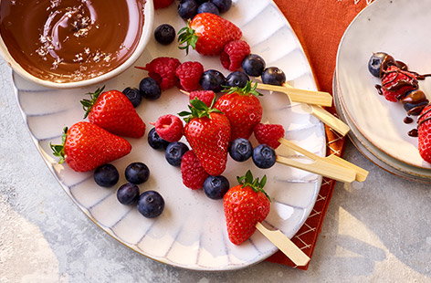 Image of "Berries with quick salted chocolate dipping sauce"