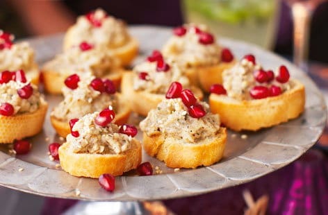 Image of "Smoked aubergine caviar crostinis with sesame and pomegranate"