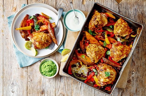 Image of "Chicken fajita traybake with pea 'guacamole'"