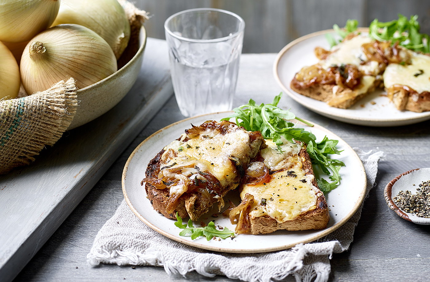Sweet balsamic onions with melted Cheddar and herbs on toast