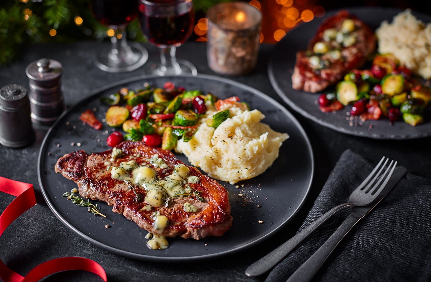 Sirloin steak with blue cheese, balsamic Brussels and horseradish mash