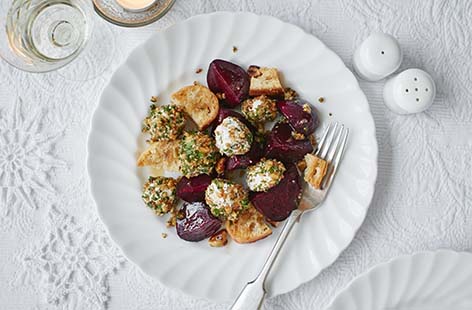 Image of "Walnut and herb-crusted goat’s cheese and beetroot salad"