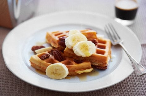 Image of "Buttery waffles with maple syrup"