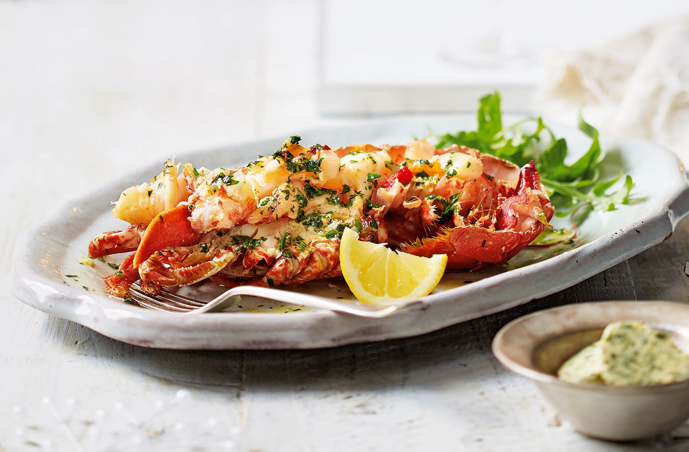 Grilled lobster with garlic and herb butter