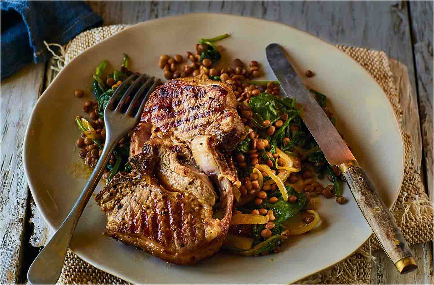 Caramelised onion and spinach lentils with peppered lamb chops