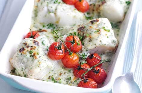 Fish with cheesy parsley sauce