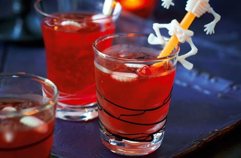 Image of "Blood lemonade with floating teeth"