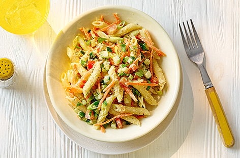 Image of "Houmous pasta salad with cucumber, tomatoes and carrots"