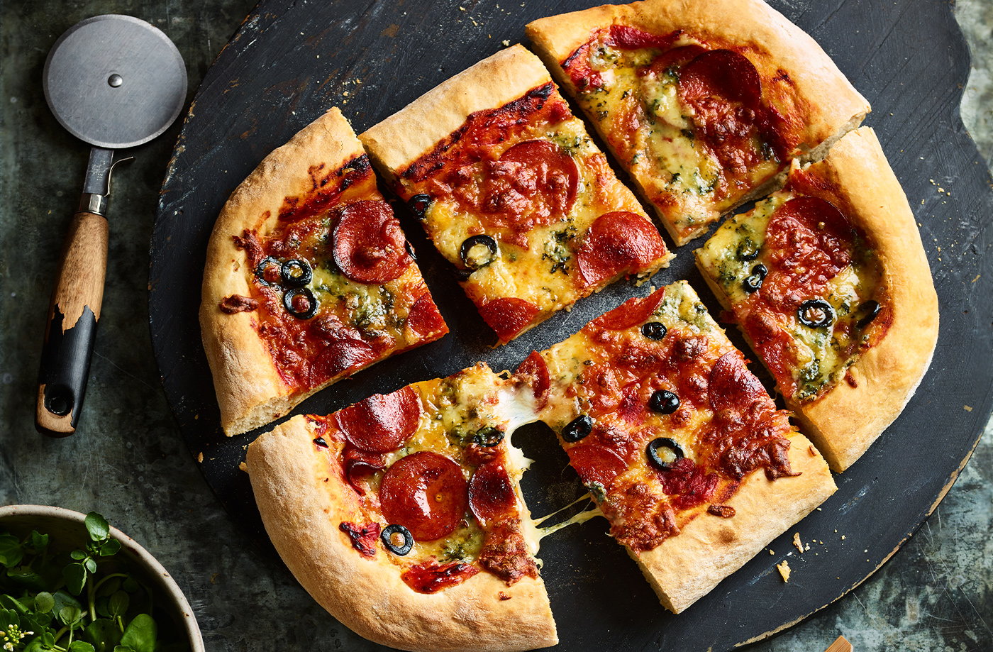 Pepperoni, mozzarella and blue cheese pizzas