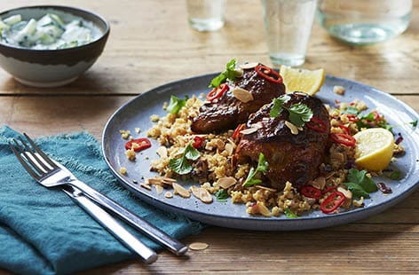 Image of "Tandoori chicken thighs with cauliflower pilaf"