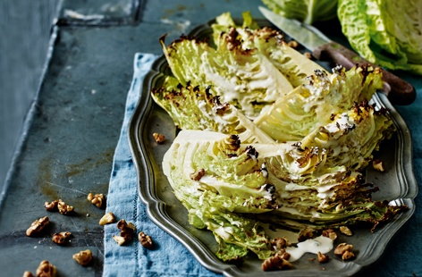 Image of "Roasted Savoy cabbage wedges with blue cheese dressing and walnuts"