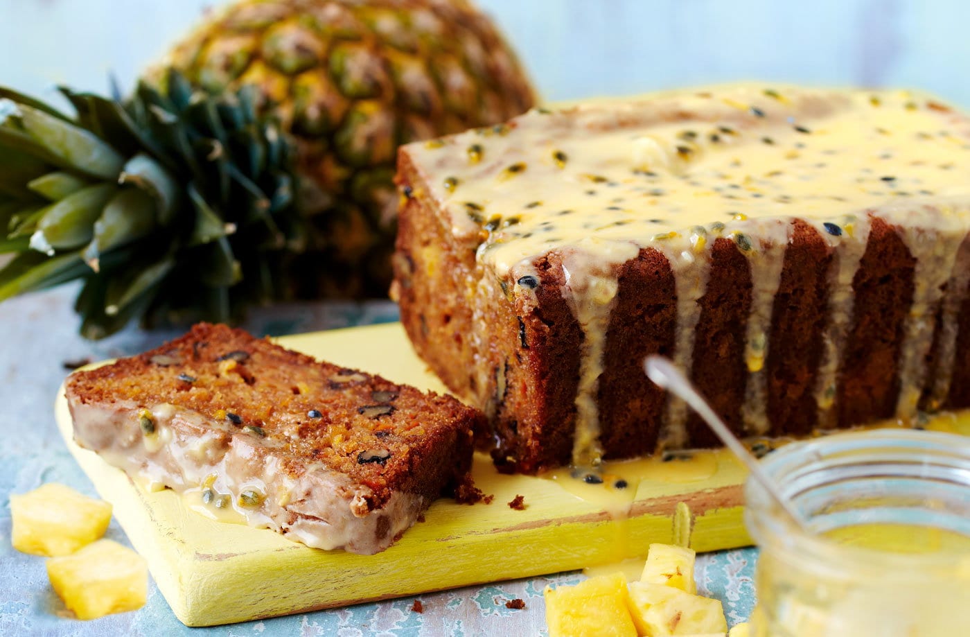 Pineapple and carrot loaf with passion fruit drizzle