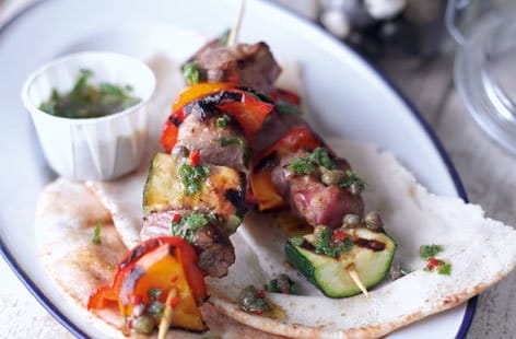 Image of "Lamb steak kebabs with mint and caper salsa"