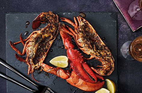 Image of "Grilled lobster with lemon and paprika butter"