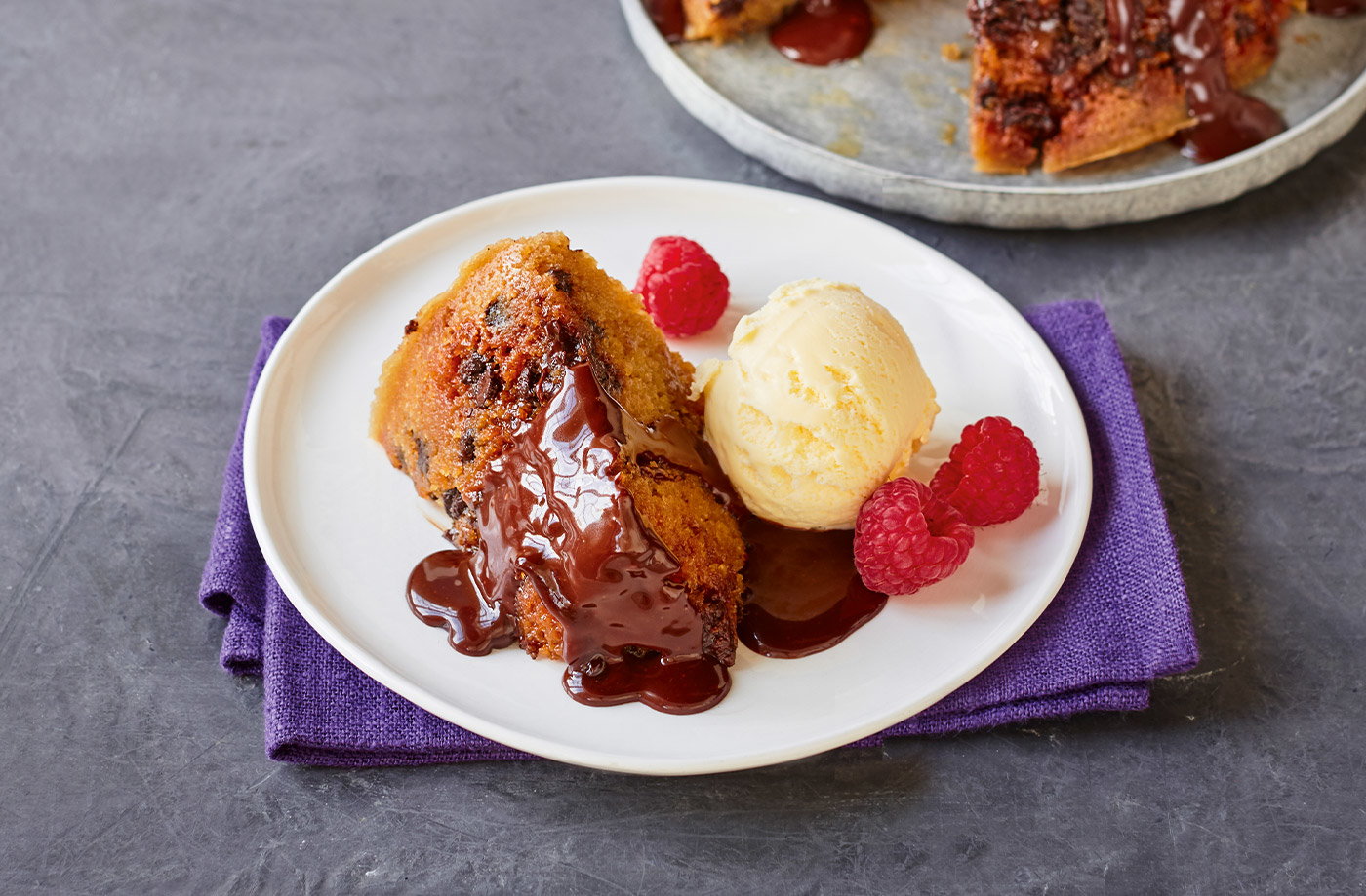 Chocolate chip steamed pudding with ice cream