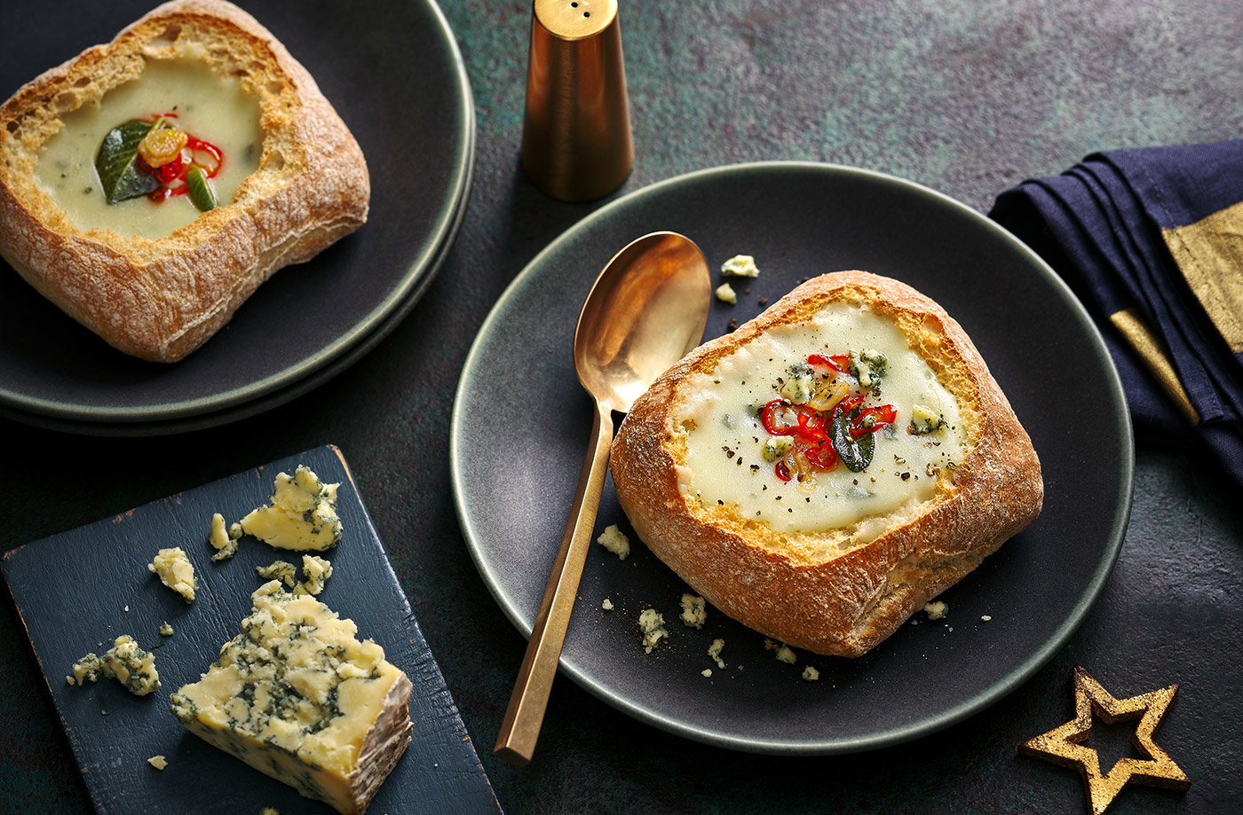 Cheese, potato and onion soup with crispy sage