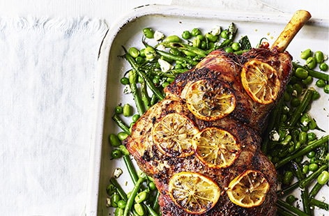 Image of "Roasted leg of lamb stuffed with feta, olives and pistachios"