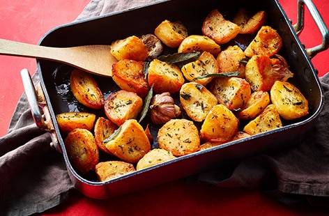 Image of "Herby triple-cooked roasties"