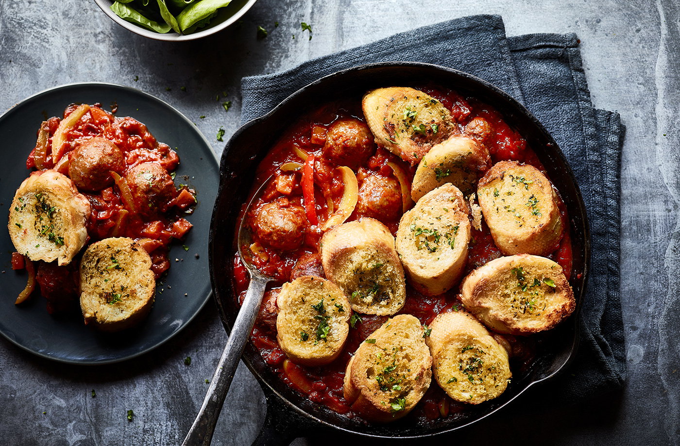 Meatballs and garlic bread bake