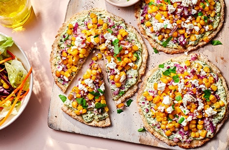 Cauliflower pizzettes with sweetcorn and feta