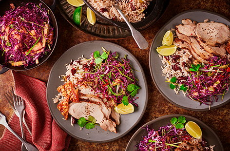 Image of "Jerk-rubbed pork with rice and peas and pineapple slaw"