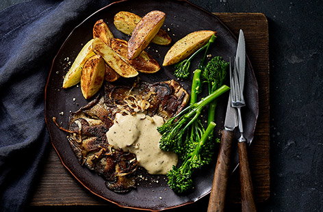 Image of "Vegan 'steak' and chips with peppercorn sauce"