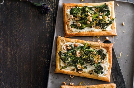 Image of "Purple sprouting broccoli, goat's cheese and hazelnut tarts"