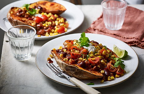 Image of "Baked sweet potatoes with fajita beans"