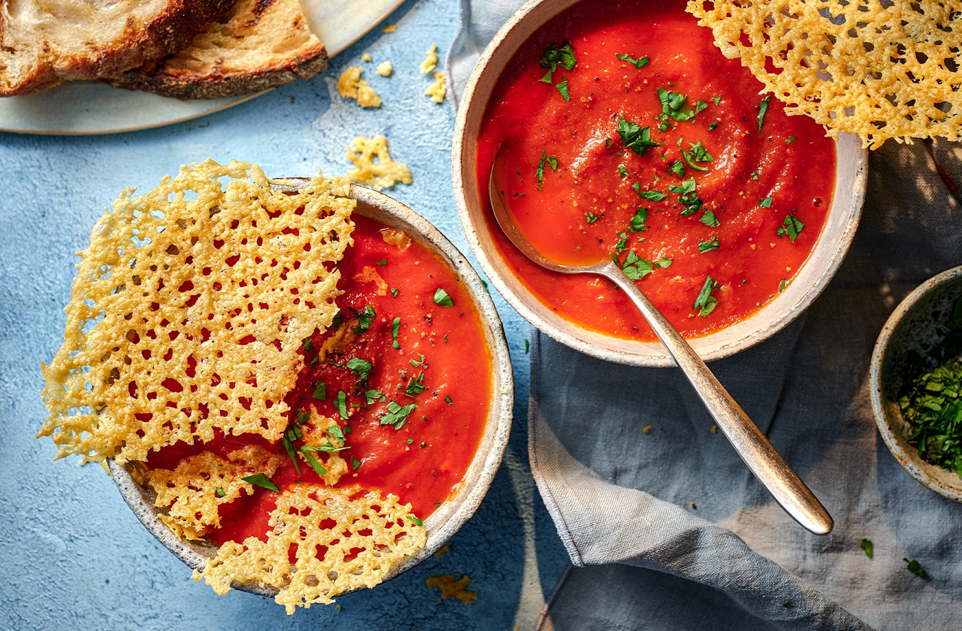 Tomato soup with cheesy topper