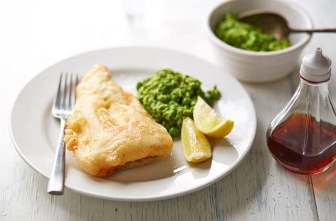 Image of "Gluten-free battered cod and mushy peas"