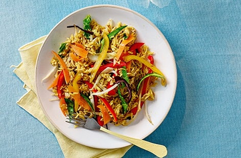 Image of "Curried egg and veggie fried rice"