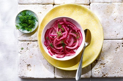 Image of "Quick pink pickled onions"