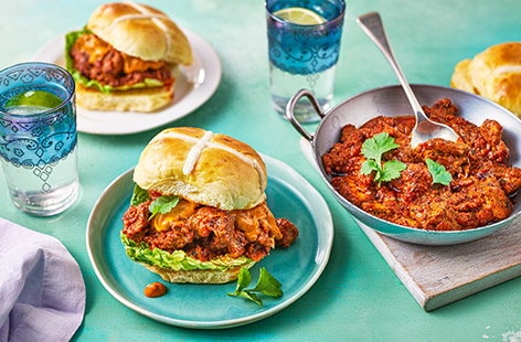Image of "Rohit Ghai's cheese hot cross bun chicken tikka sandwich"