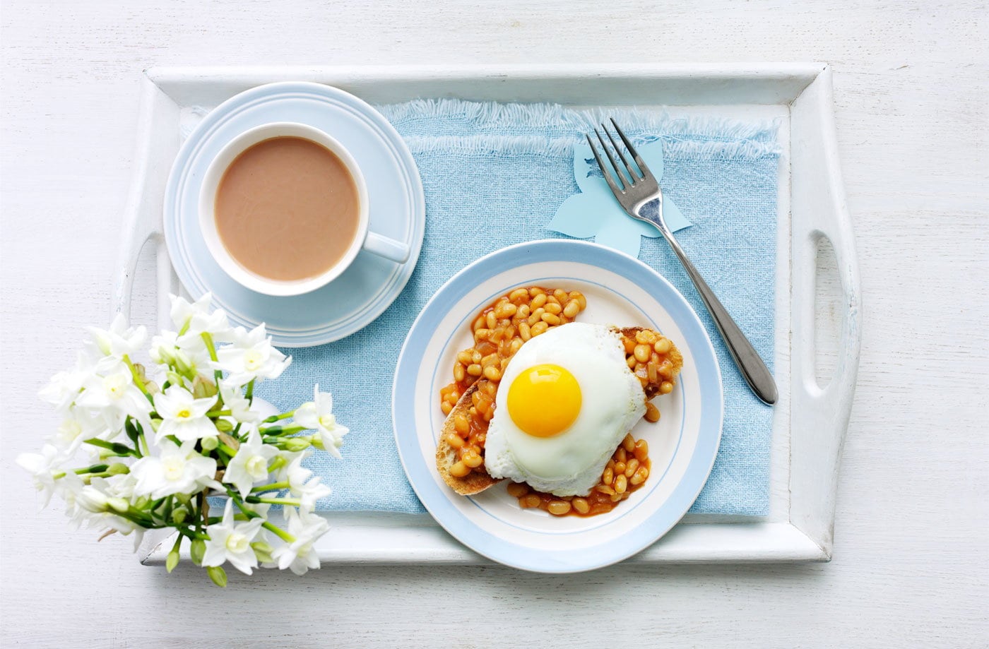 Barbecue beans on toast with an egg