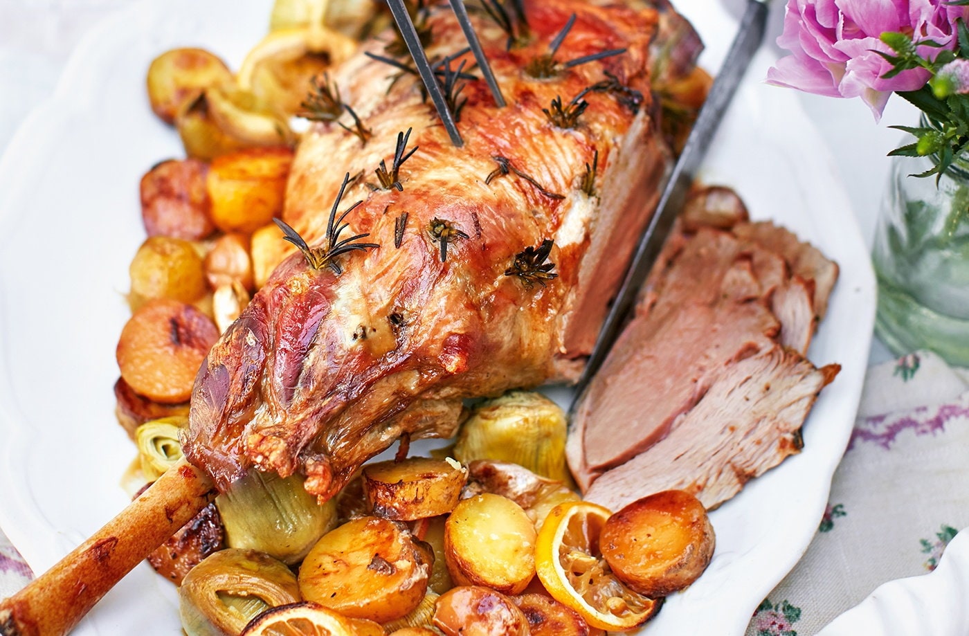 Roast lamb with artichokes, rosemary, lemon and potatoes
