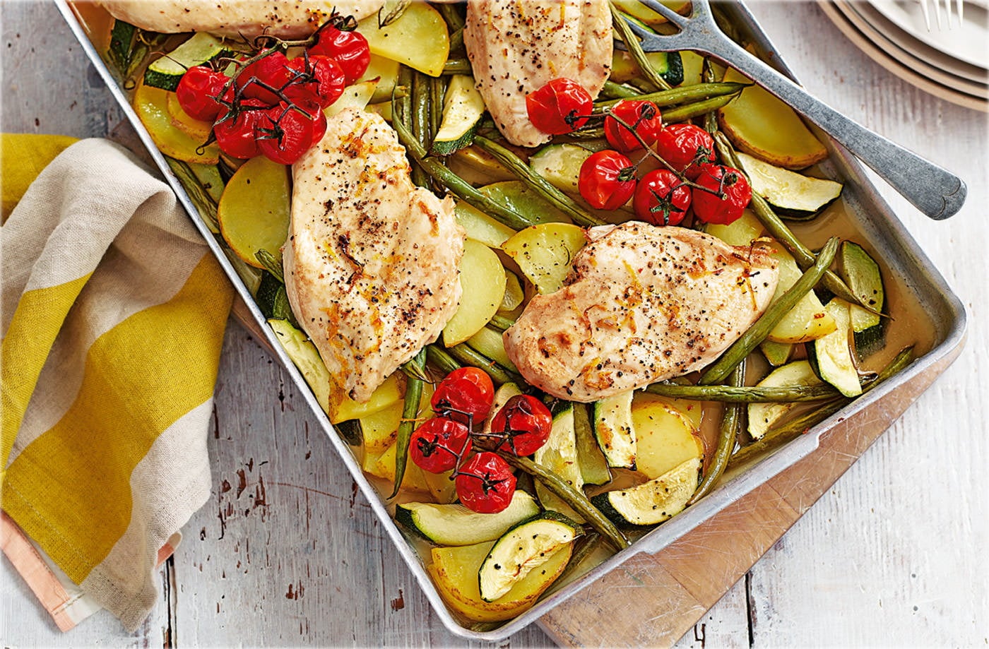 Chicken traybake with vine tomatoes and courgettes