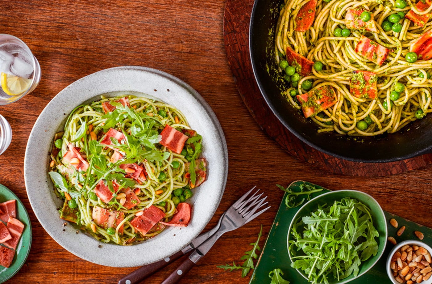 Pea pesto pasta with crispy meat-free bacon