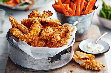 Image of "Crunchy chicken goujons with carrot 'fries'"