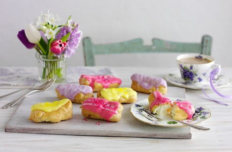 Image of "Mini eclairs with coloured icing"