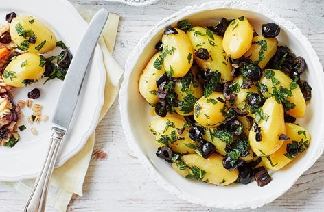 Image of "New potatoes with mint oil and black olives"