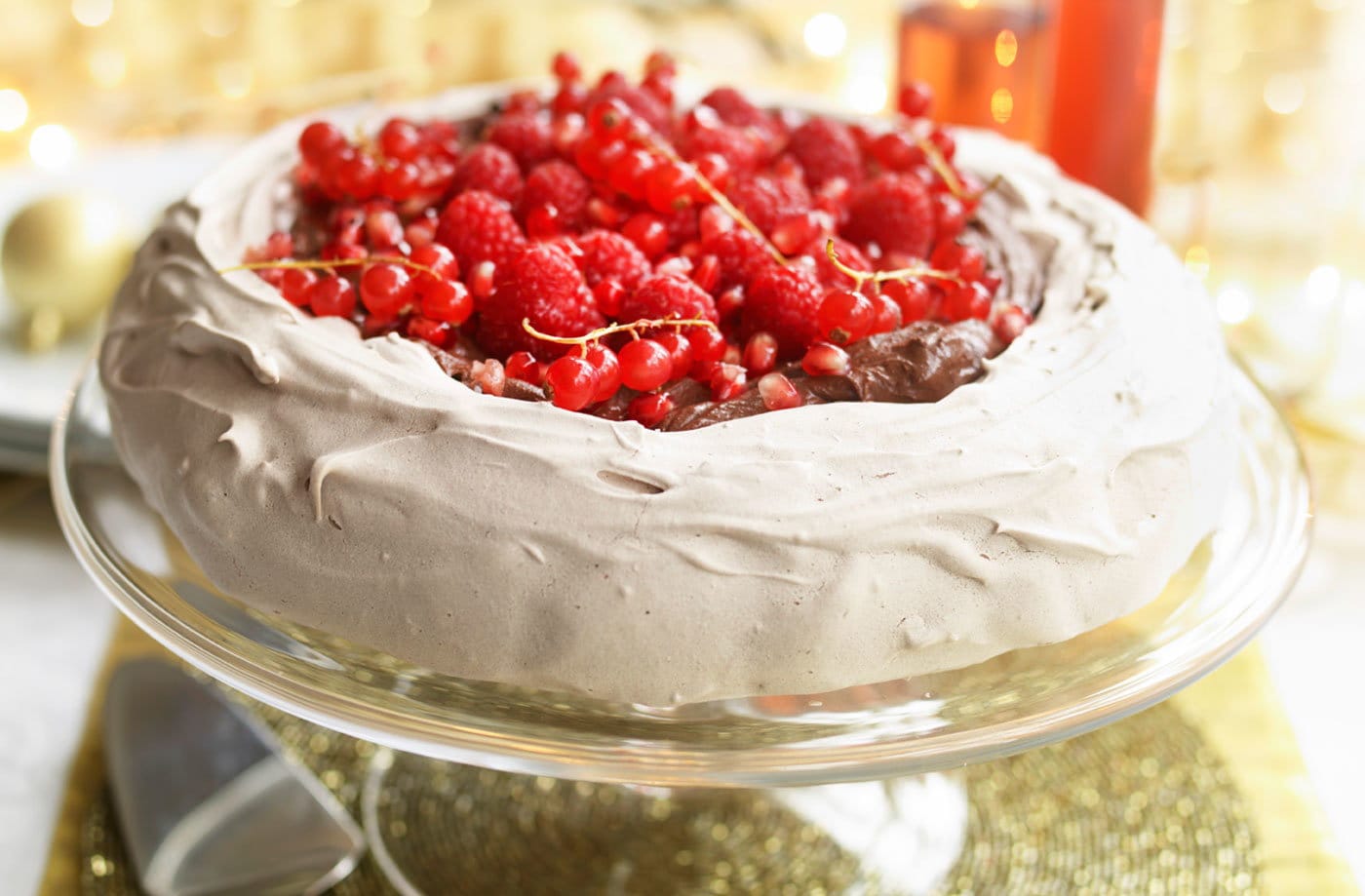Dairy-free chocolate, raspberry and pomegranate Pavlova 