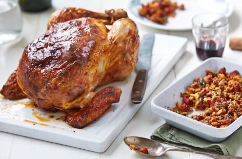 Image of "Spiced roast chicken with herb stuffing"
