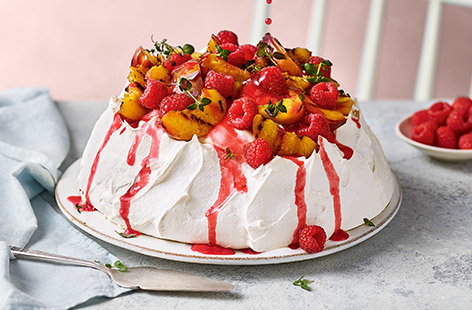Image of "Peach melba pavlova"