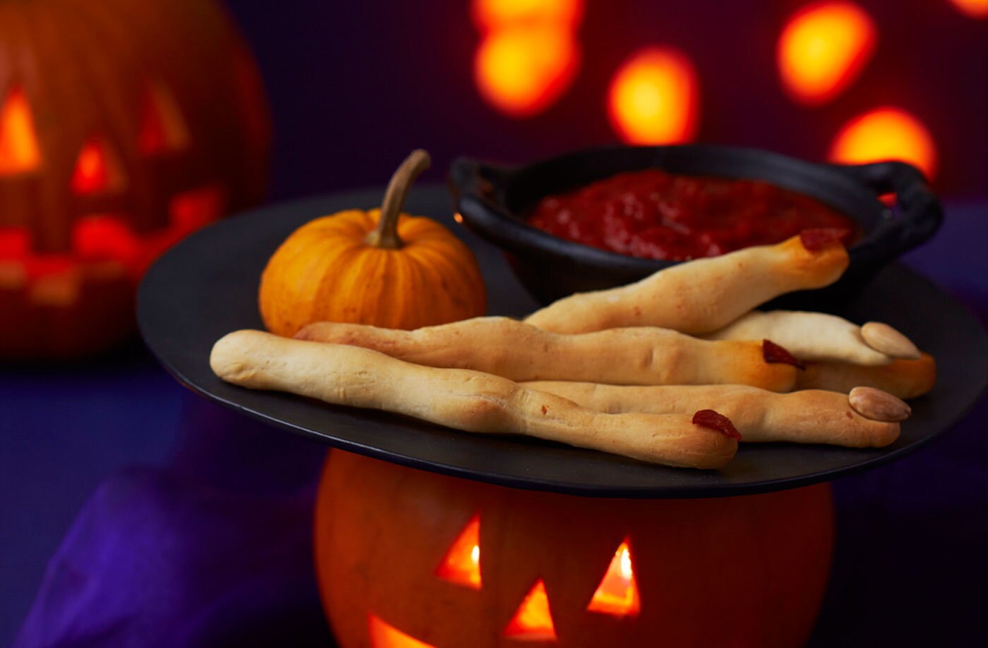 Cheesy witches' fingers with bloody dip