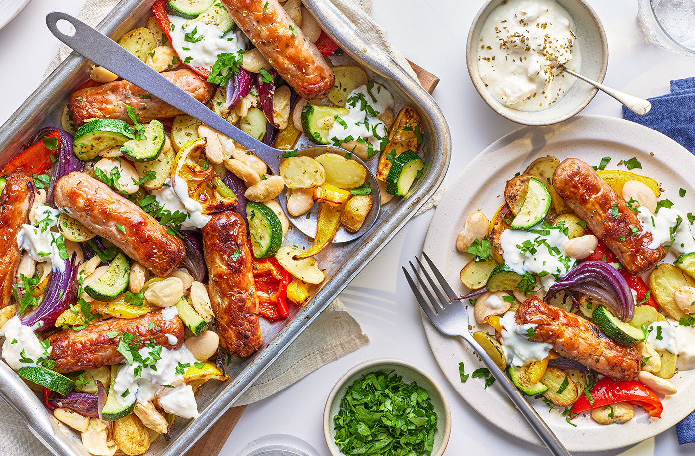 Greek-style sausage and butter bean traybake