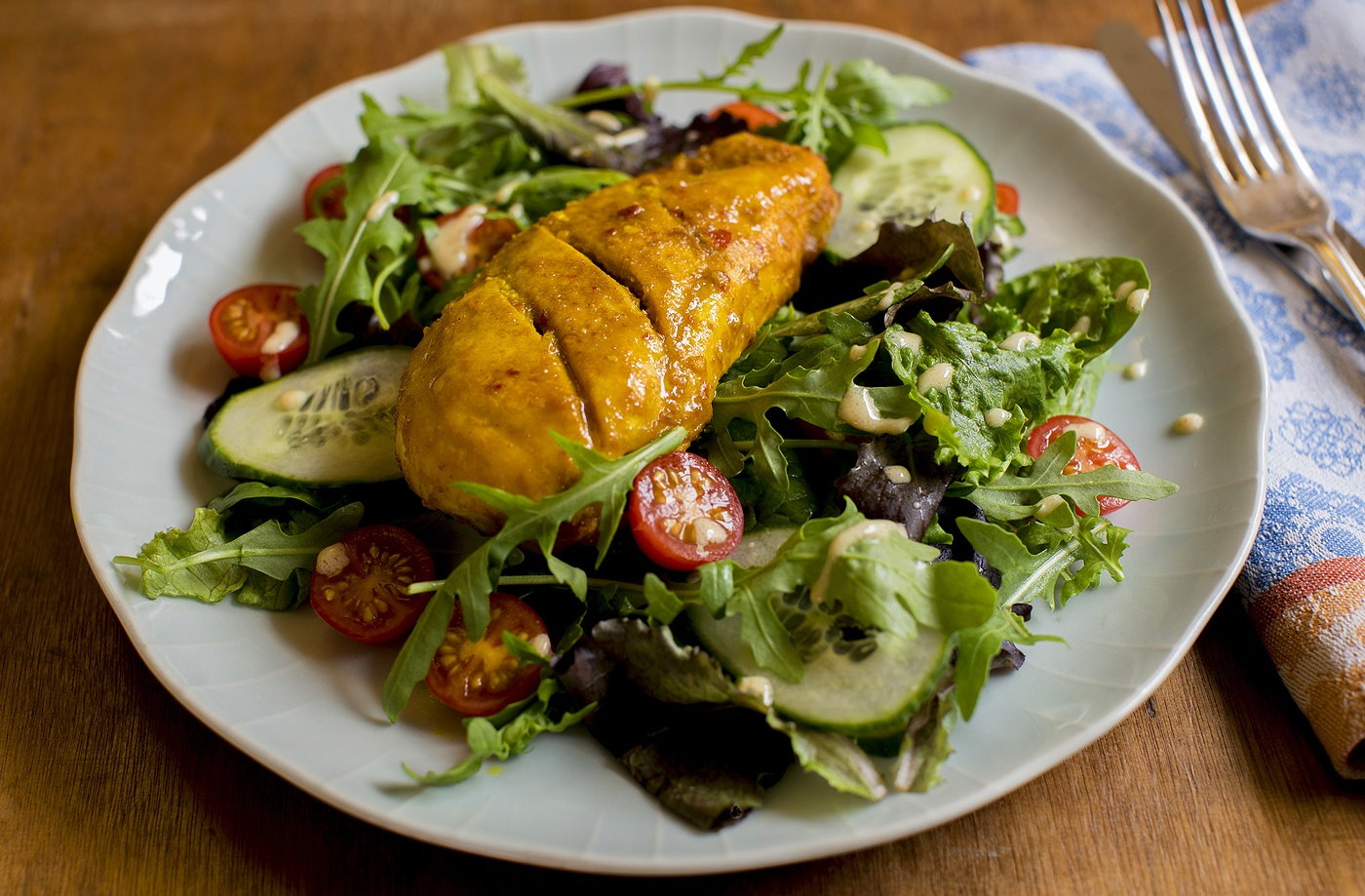 Spicy glazed chicken with a curry salad dressing