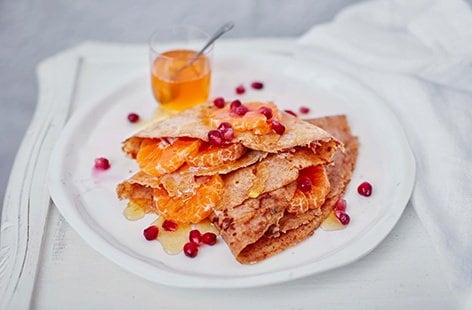 Image of "Spelt pancakes with clementine and pomegranate"