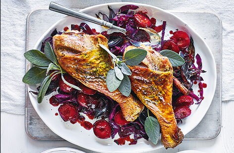 Image of "Turkey legs with cabbage and plums"