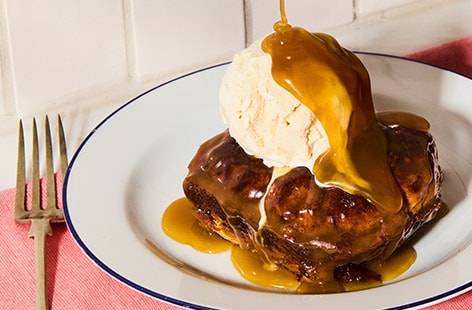Image of "Hot cross bun sticky toffee pudding"